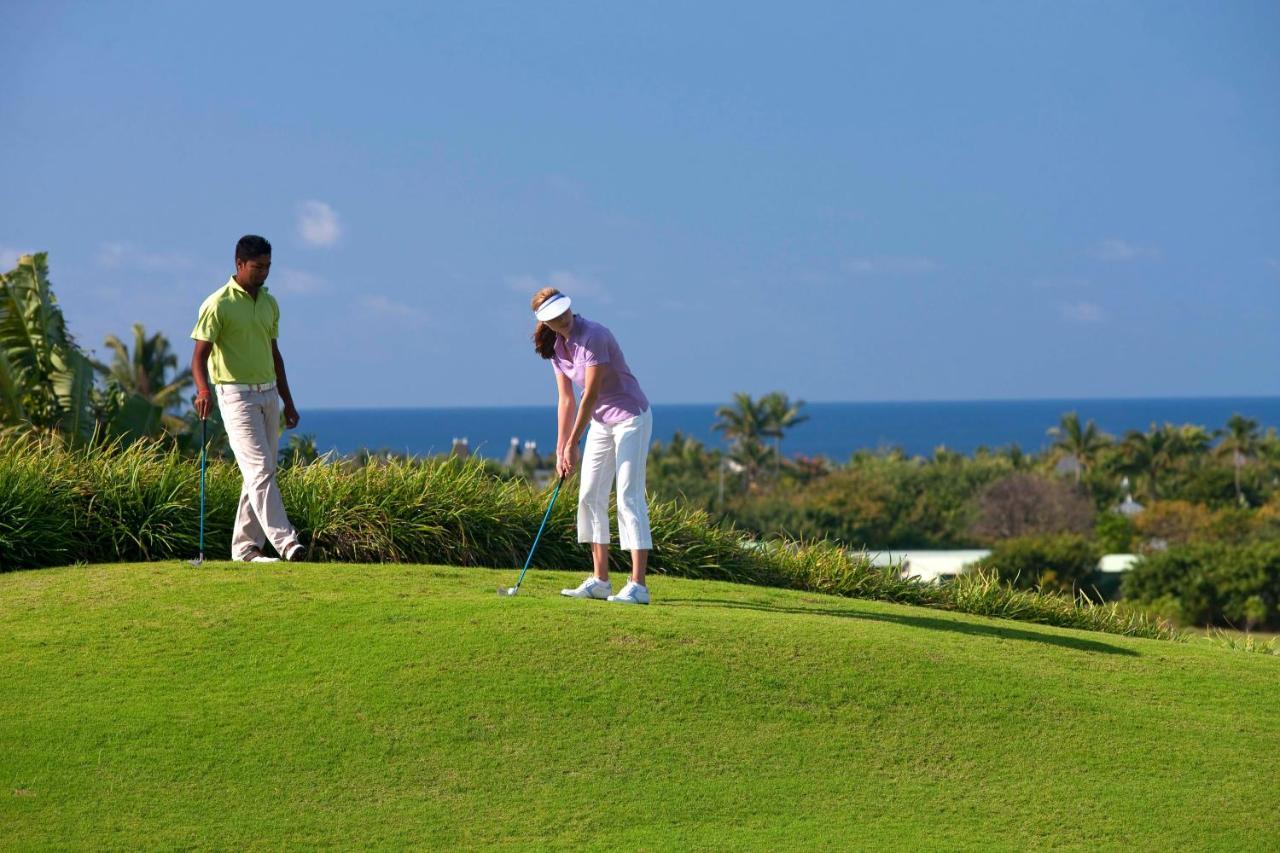 Heritage Le Telfair Golf & Wellness Resort Bel Ombre Kültér fotó Golfers at the Four Seasons Resort