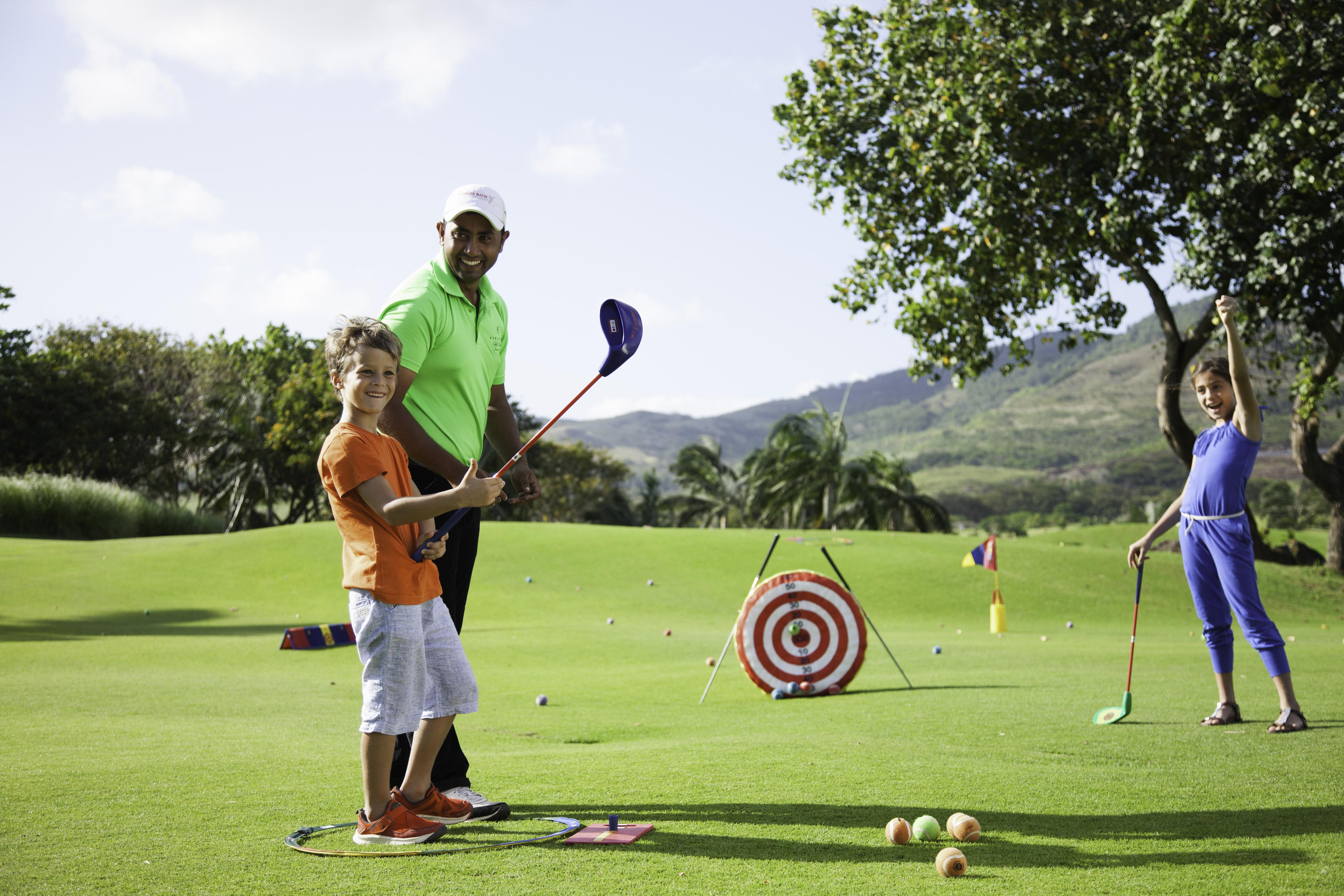 Heritage Le Telfair Golf & Wellness Resort Bel Ombre Kültér fotó Tiger Woods with his children